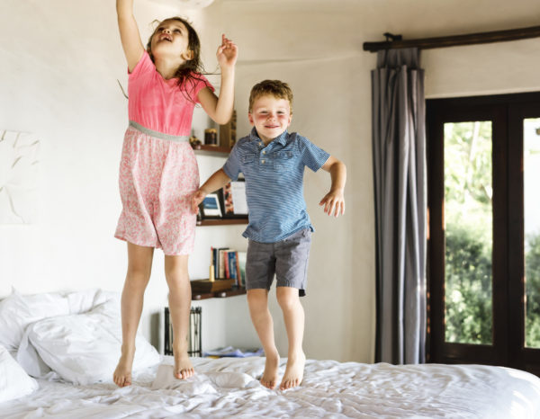 Children jumping on the bed Children jumping on the bed